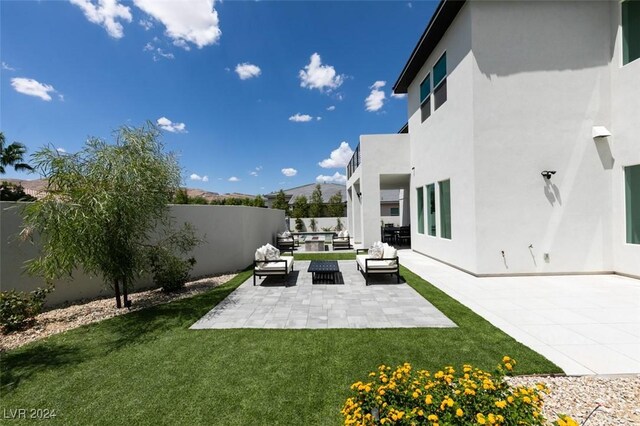 view of yard with a patio and an outdoor hangout area