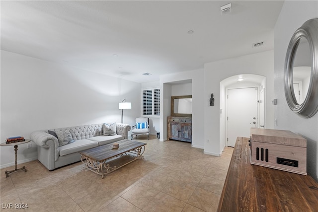 living room featuring light tile patterned floors