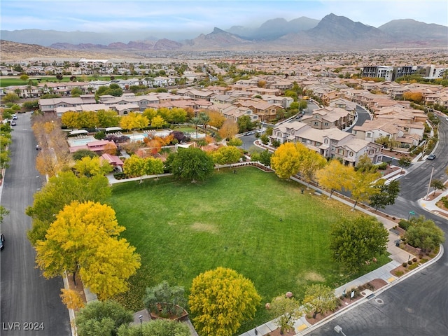 birds eye view of property featuring a mountain view