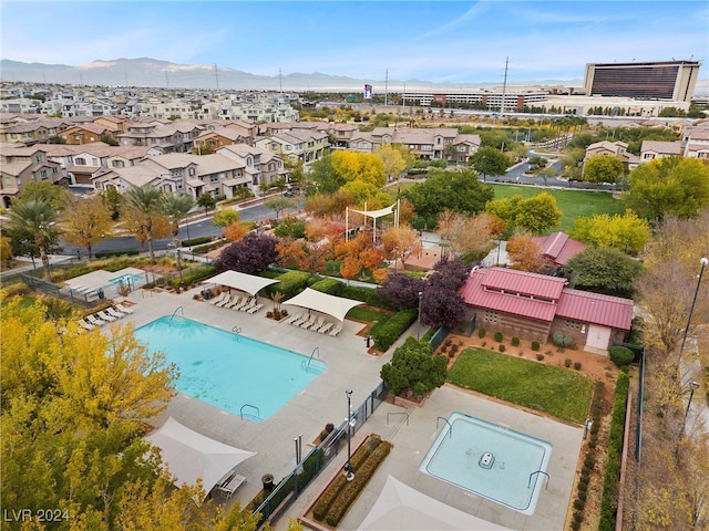 drone / aerial view featuring a mountain view