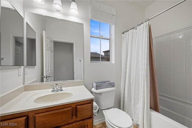 full bathroom with vanity, toilet, and shower / bath combo with shower curtain