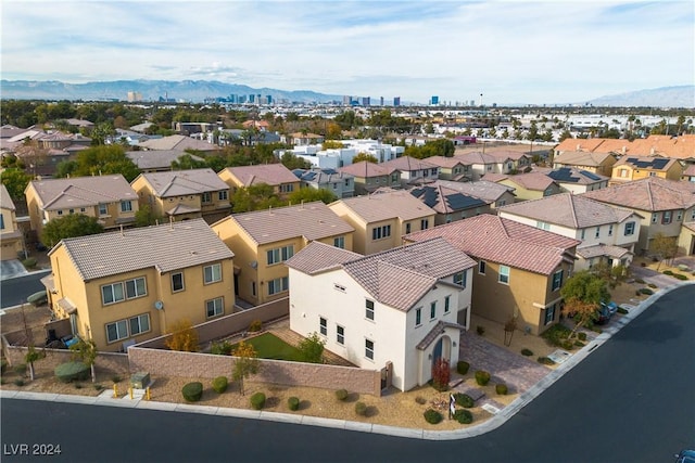 birds eye view of property featuring a mountain view