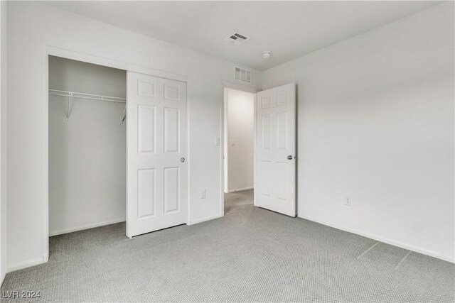 unfurnished bedroom featuring a closet