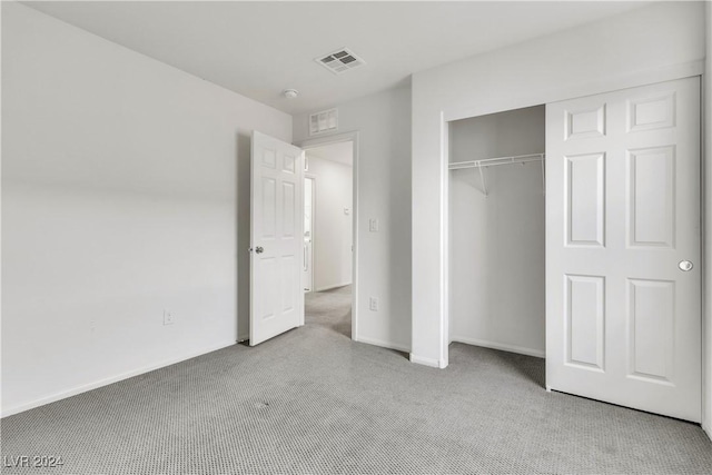 unfurnished bedroom with a closet