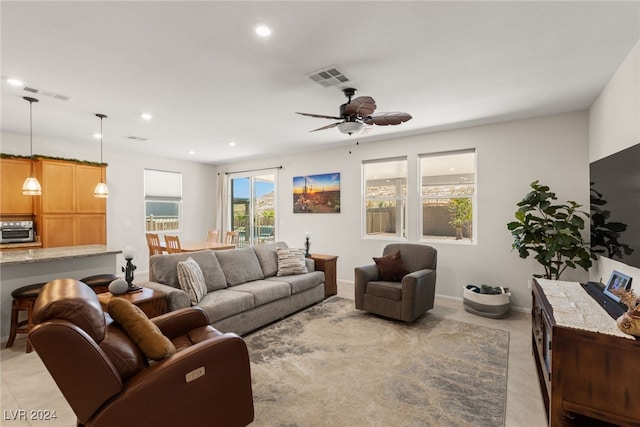 living room featuring ceiling fan