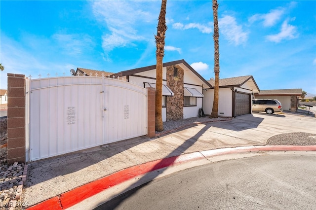 view of front of property with a garage