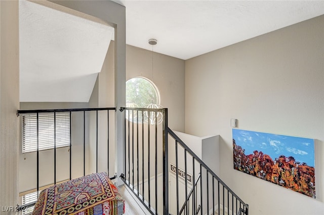 hallway with vaulted ceiling