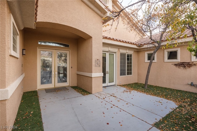 doorway to property with french doors and a patio