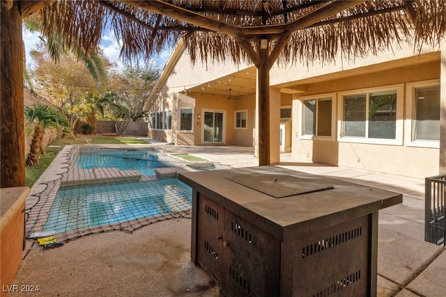 view of swimming pool featuring a patio area