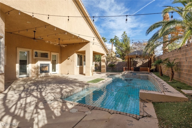 view of pool featuring a gazebo and a patio area