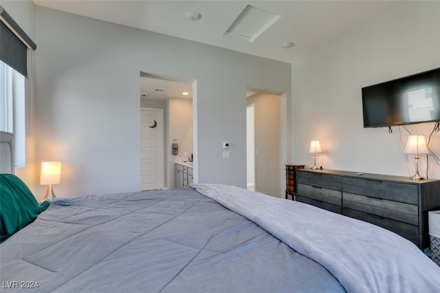 bedroom featuring ensuite bath