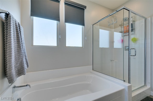 bathroom with independent shower and bath