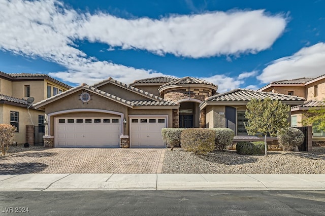 view of front of home with a garage