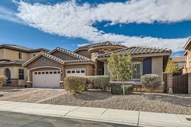 view of front of property with a garage