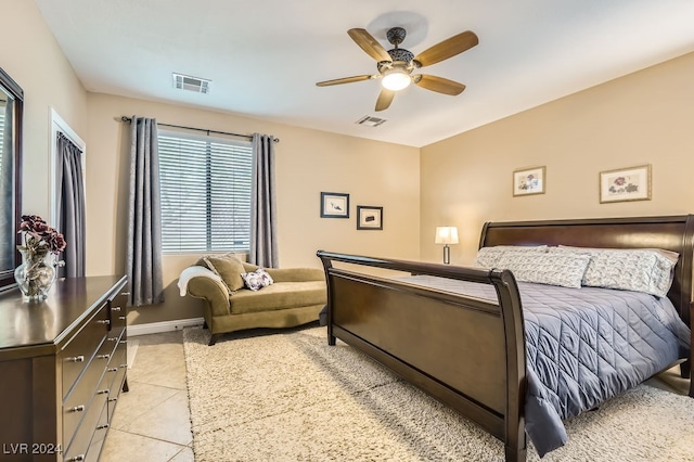 bedroom featuring ceiling fan and light tile patterned floors