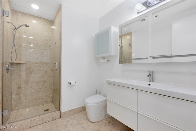 4575 Dean Martin Dr Unit 2211, Las Vegas, NV 89103 - full bath featuring vanity, a shower stall, tile patterned floors, toilet, and baseboards