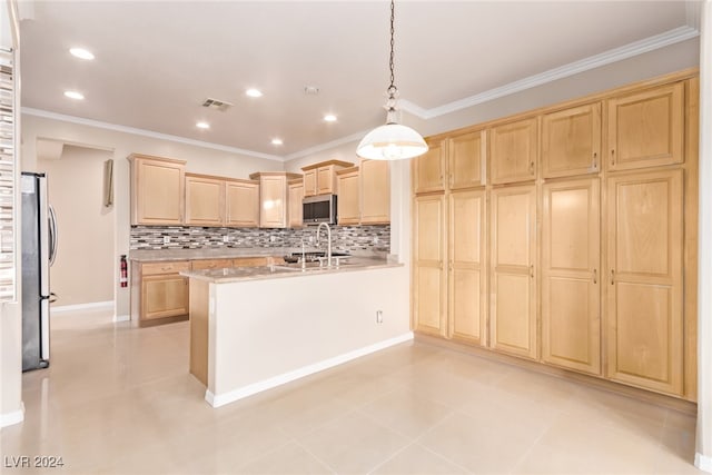 kitchen with appliances with stainless steel finishes, tasteful backsplash, hanging light fixtures, and light brown cabinetry