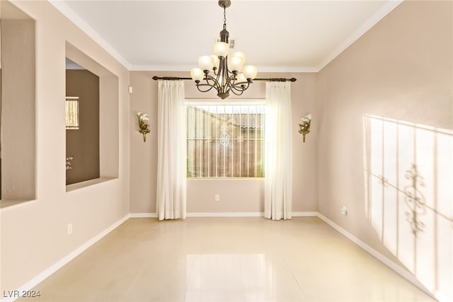 empty room with tile patterned floors, crown molding, and an inviting chandelier