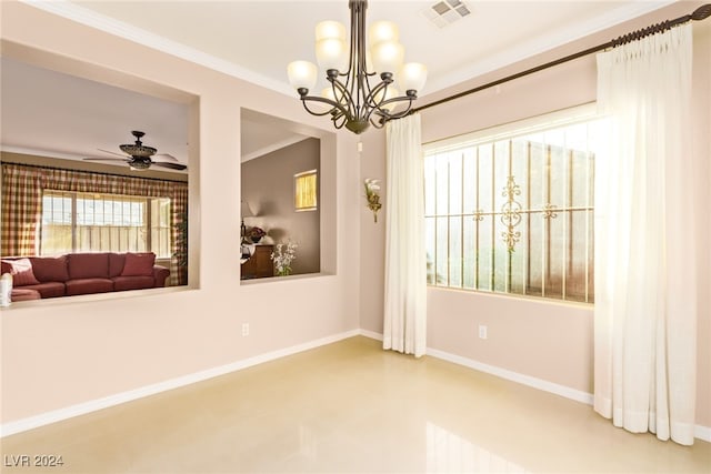 empty room featuring ceiling fan with notable chandelier and ornamental molding