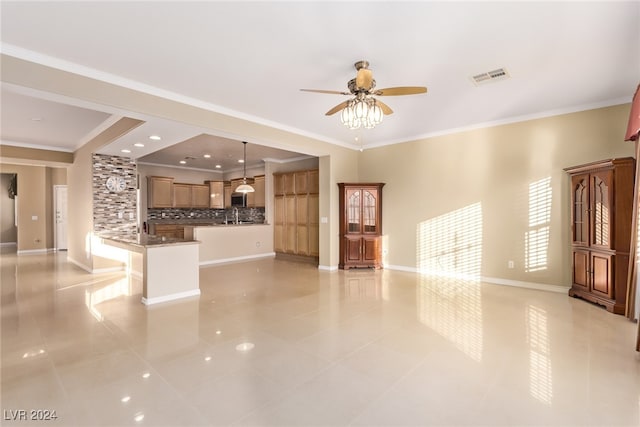 unfurnished living room with ceiling fan, light tile patterned flooring, and ornamental molding