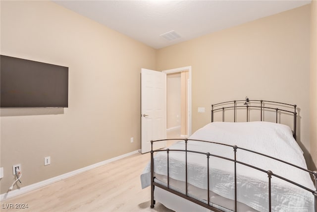 bedroom featuring light hardwood / wood-style flooring