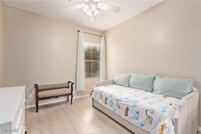 bedroom with ceiling fan and light wood-type flooring