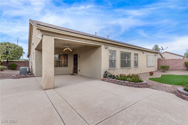 back of property featuring central air condition unit, a patio area, and ceiling fan