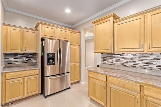 kitchen featuring decorative backsplash, stainless steel fridge with ice dispenser, and crown molding