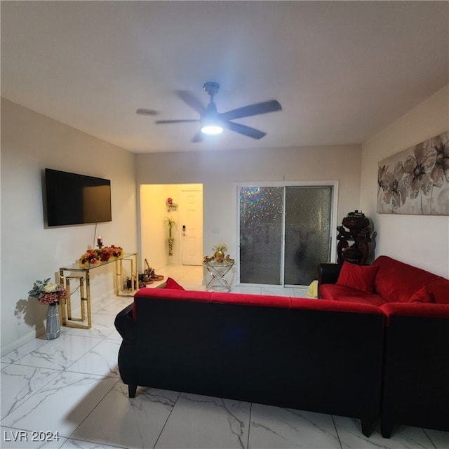 living room with ceiling fan