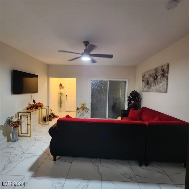 living room featuring ceiling fan