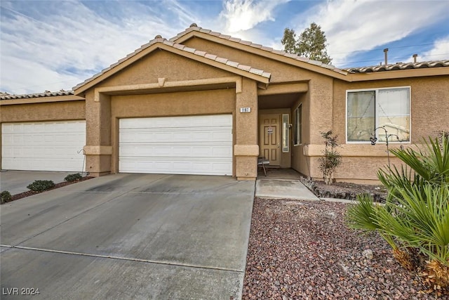 view of front of property featuring a garage