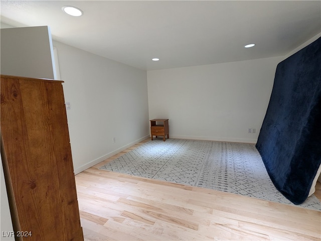 unfurnished room with light hardwood / wood-style floors