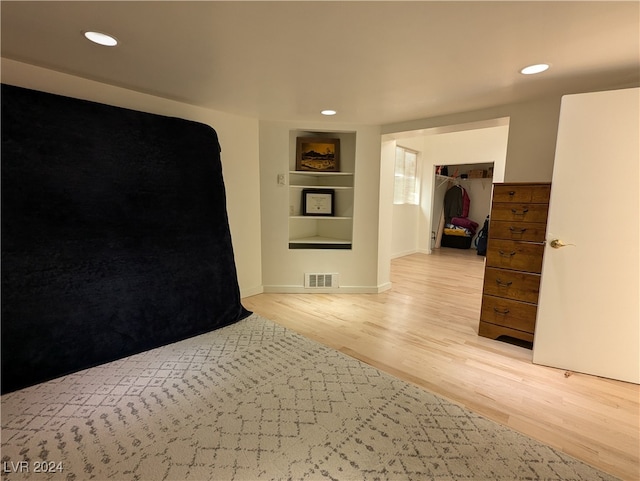 unfurnished bedroom featuring light hardwood / wood-style floors