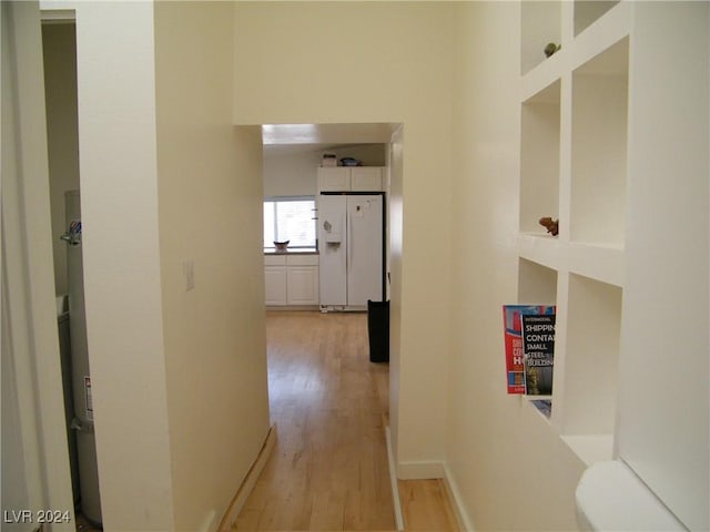 corridor featuring light hardwood / wood-style flooring