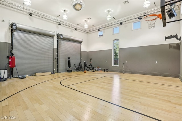 view of sport court featuring a wealth of natural light