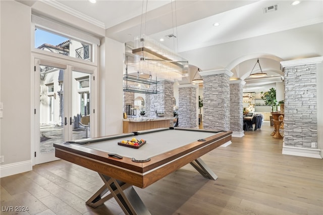 game room featuring light wood-type flooring, crown molding, billiards, and french doors