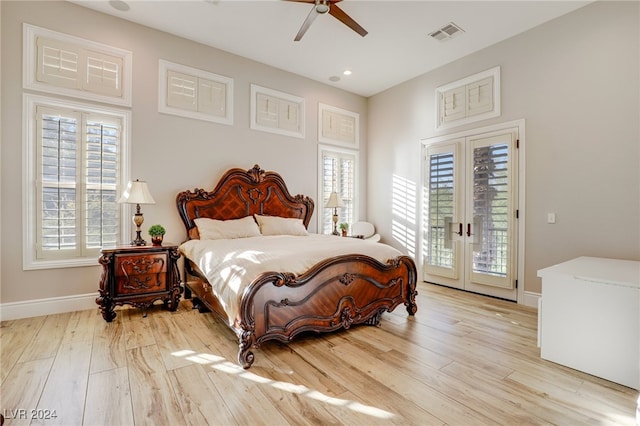 bedroom with french doors, light wood-type flooring, access to outside, and ceiling fan