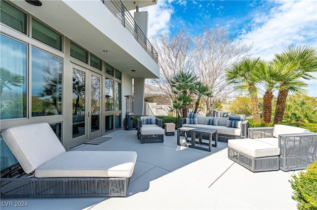 view of patio with outdoor lounge area and french doors