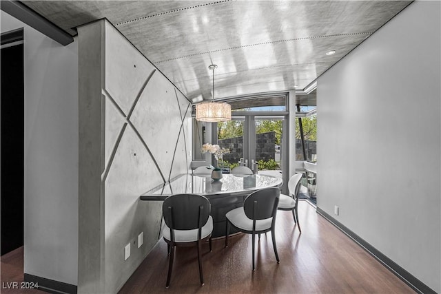 dining space featuring french doors and hardwood / wood-style flooring