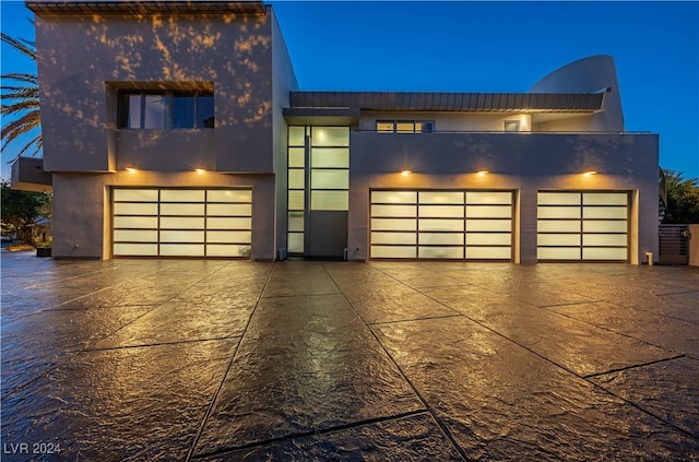 modern home featuring a garage