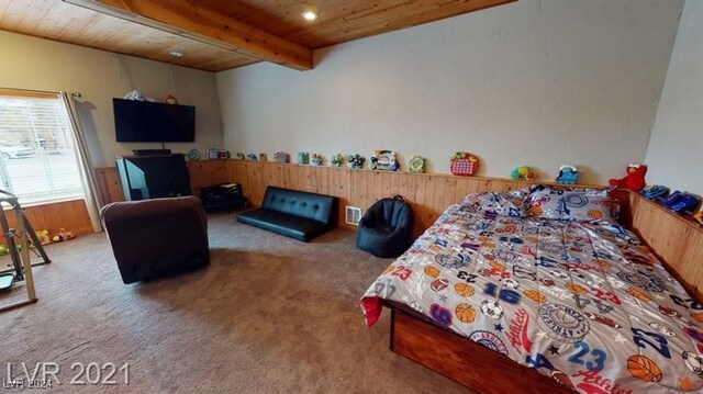 bedroom with wood ceiling, carpet floors, and beamed ceiling