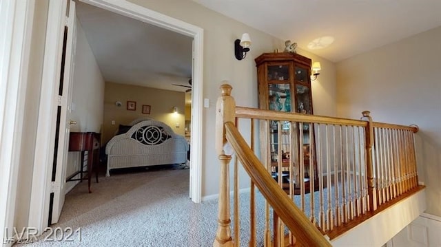 hallway featuring carpet