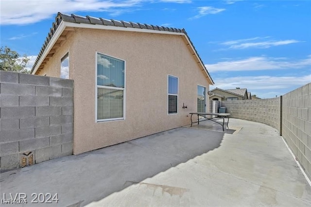 rear view of house with a patio area