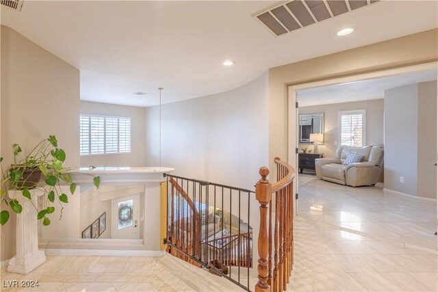 1819 Wild Indigo Ct, Las Vegas, NV 89123 - staircase with plenty of natural light, recessed lighting, and tile patterned floors