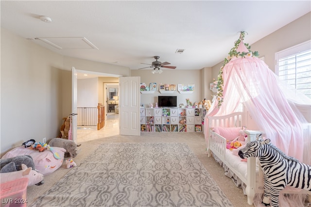 carpeted bedroom with ceiling fan