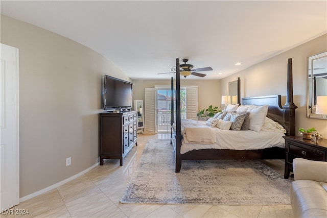 tiled bedroom with ceiling fan