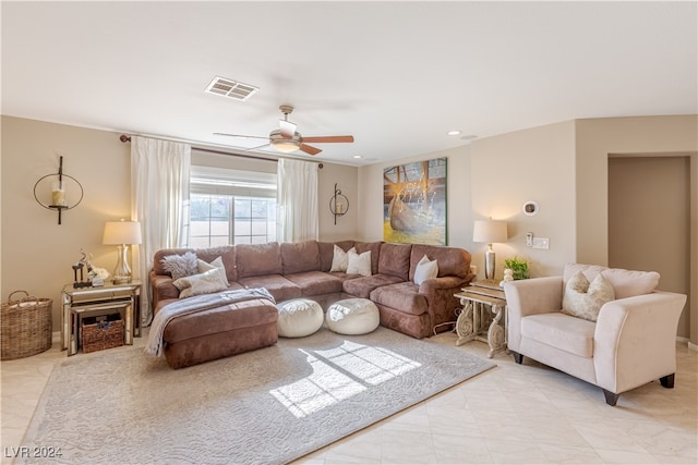 living room featuring ceiling fan