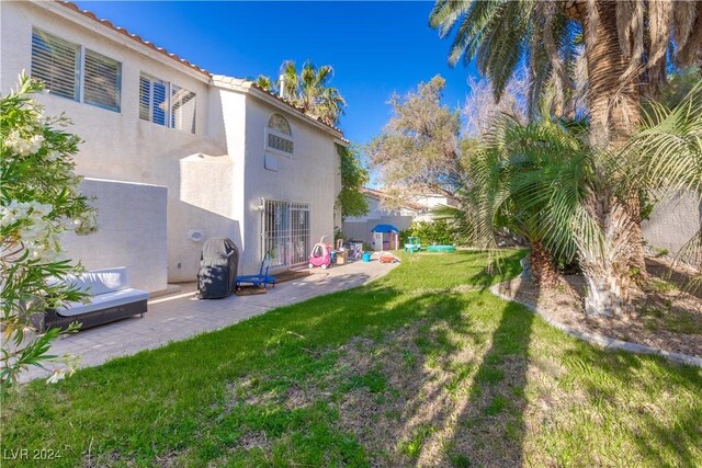 1819 Wild Indigo Ct, Las Vegas, NV 89123 - view of grassy yard with a patio