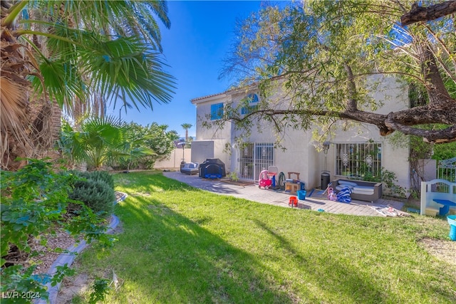 view of yard with a patio area