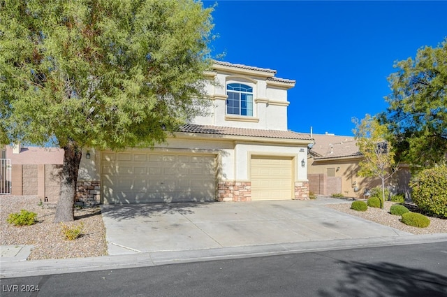 view of front of home with a garage